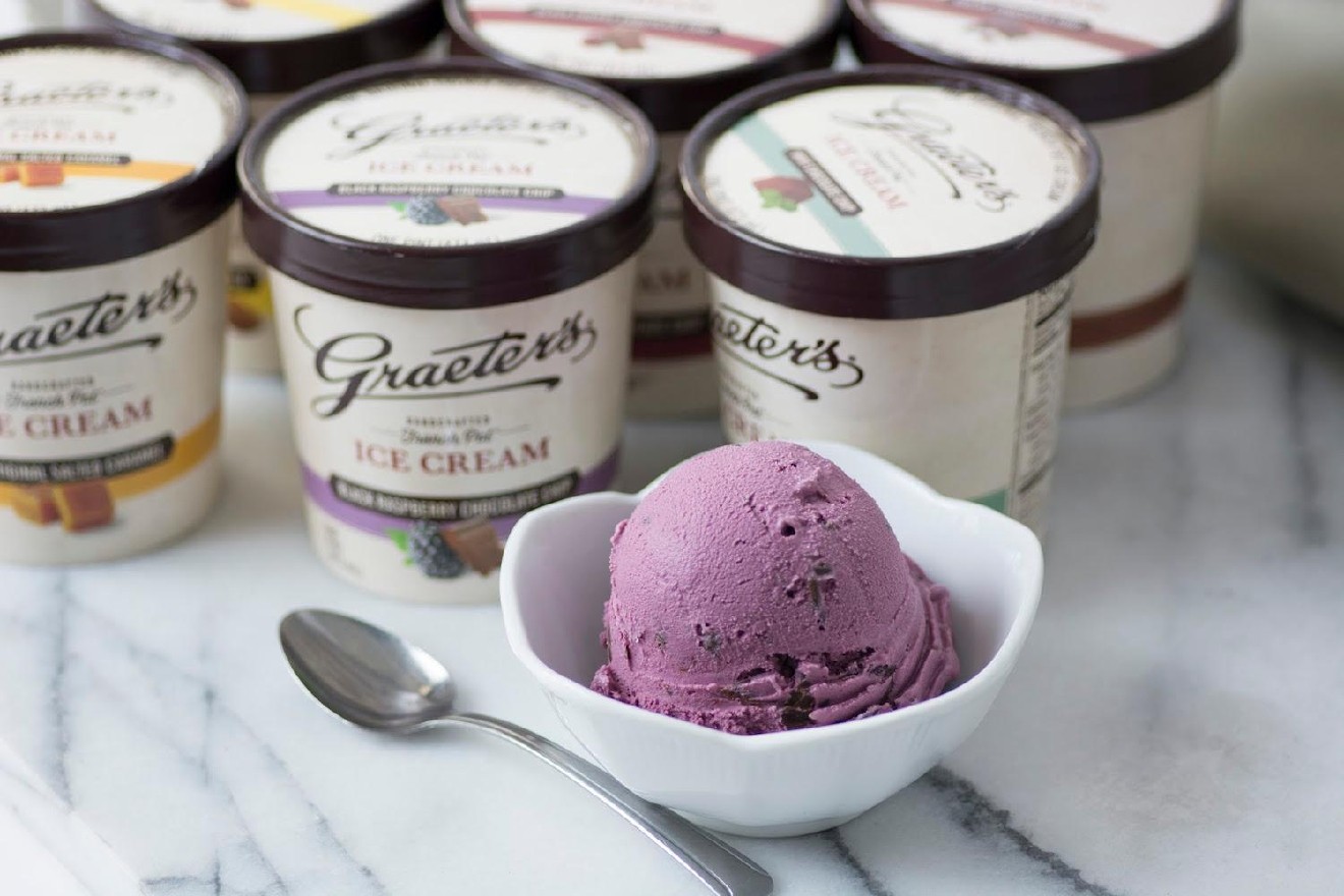 various cartons of Greater's ice cream besides a bowl with a scoop of ice cream