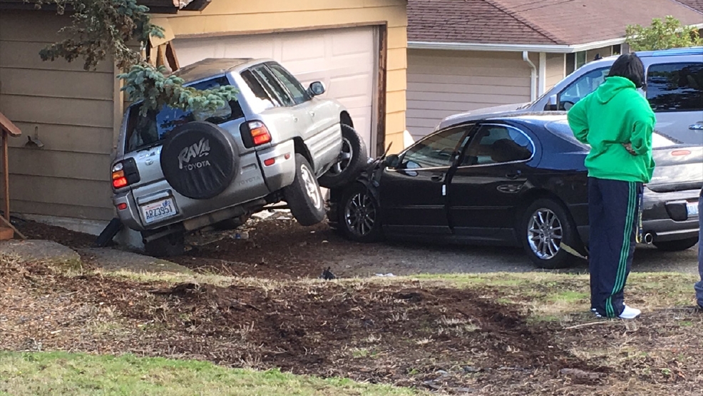 Suv Plows Into Garage Of Kent Home After Swerving To Avoid Crash