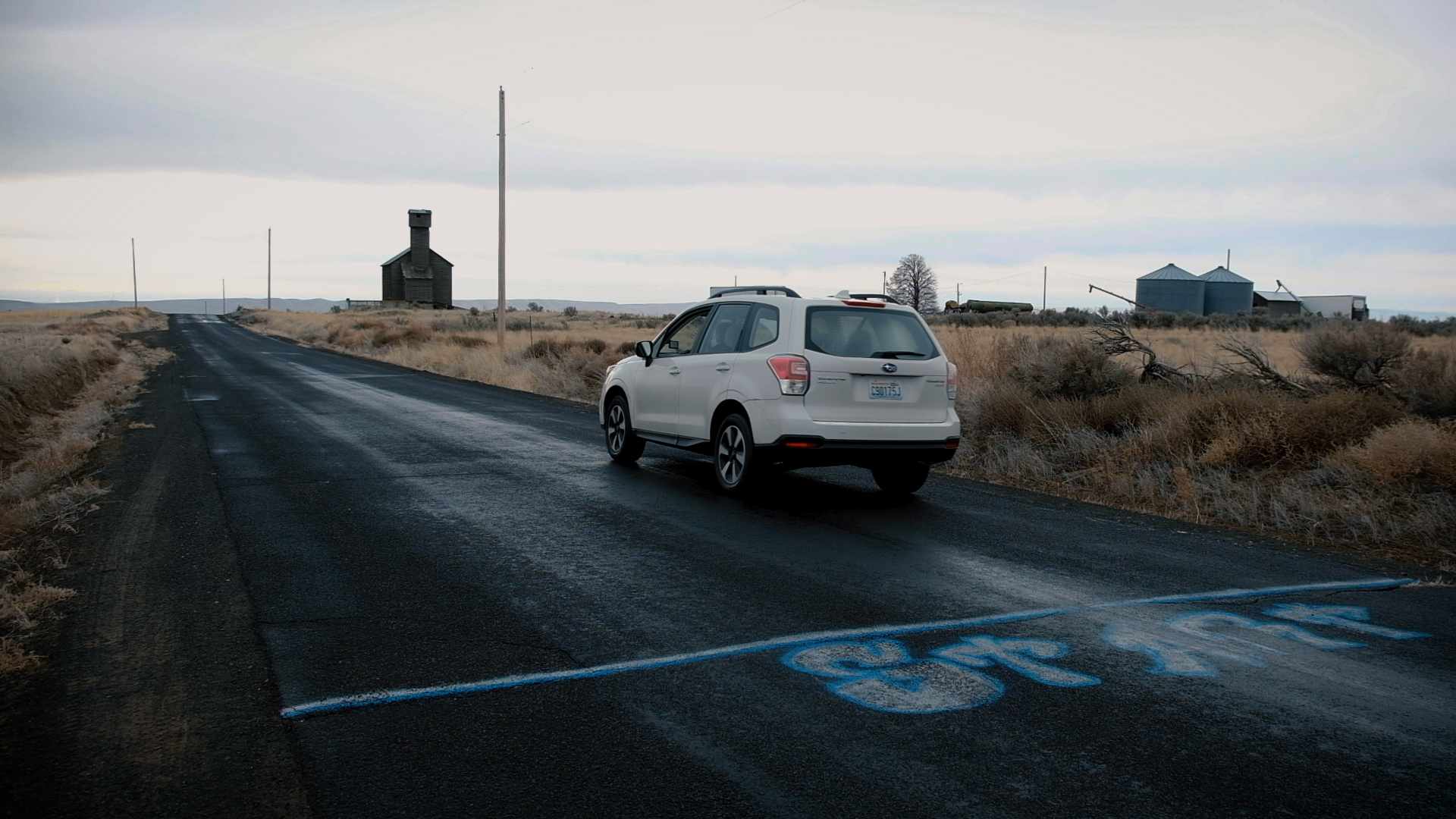 Cars seemingly roll uphill by themselves on Gravity Hill outside